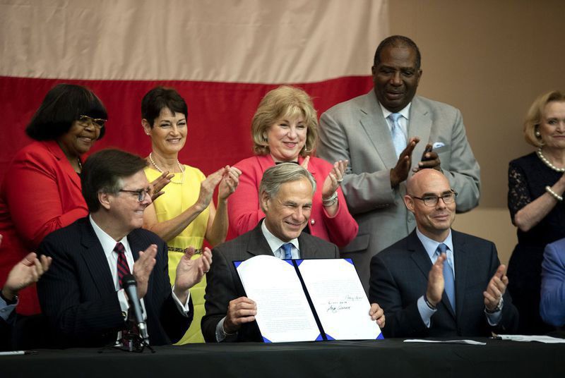 Abbott signs school finance bill into law